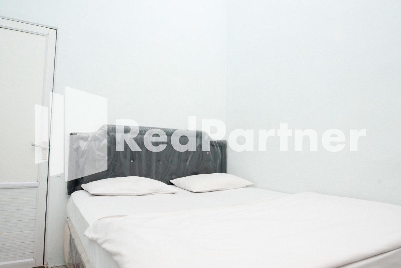 Happy Inn Puspo Mitra Reddoorz Jomblang Buitenkant foto